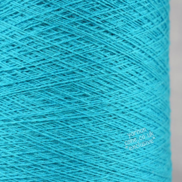 A cone of soft cashmere merino wool mix yarn on cone for machine knitting on home knitting machine